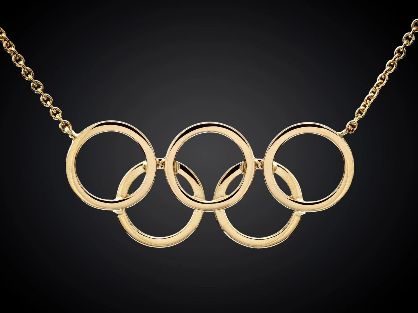 Olympiade | 14 karaat geelgouden collier met olympische ringen | groot| aan een anker collier