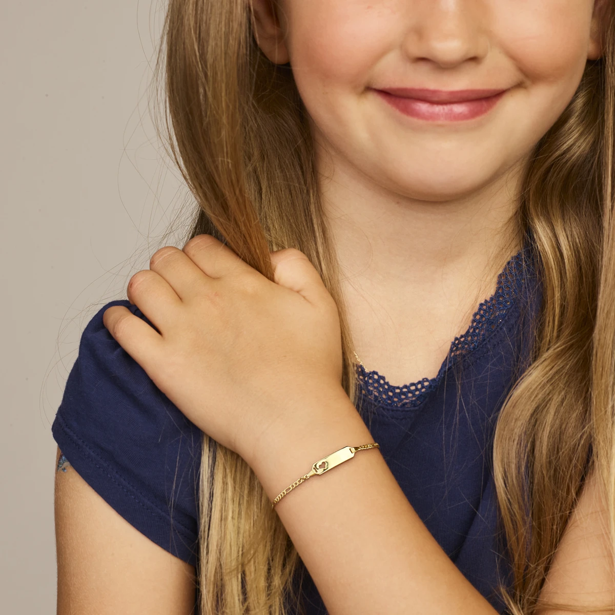 graveerarmband figaro hart plaat 5,0 mm 14K geelgoud
