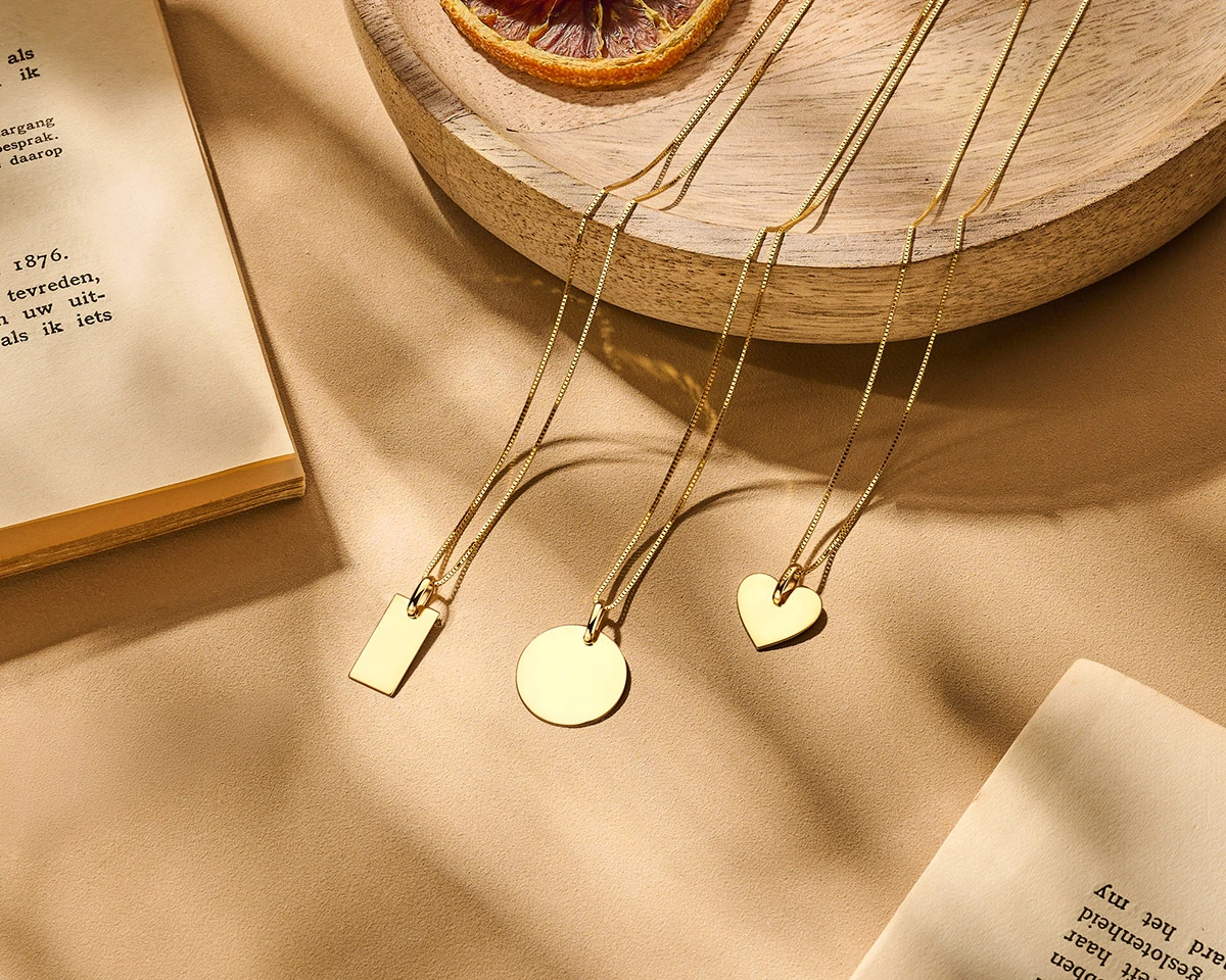 graveerhanger rond 14K geelgoud