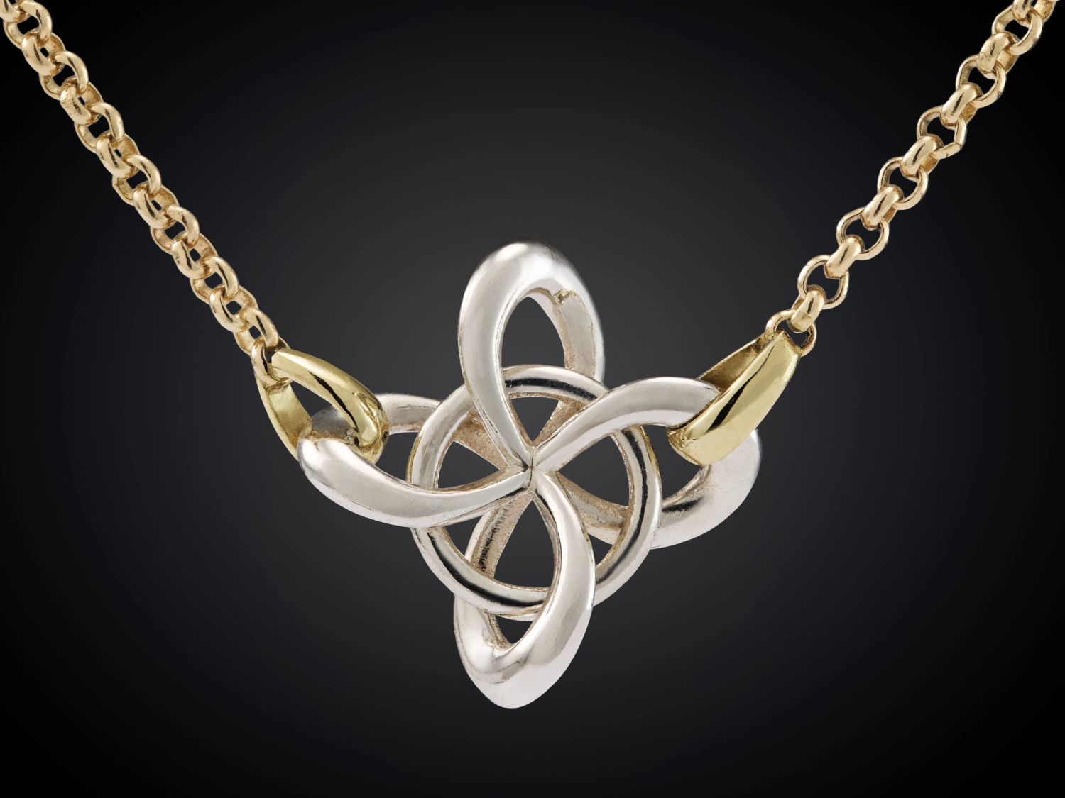 Infinity armband geel met witgoud