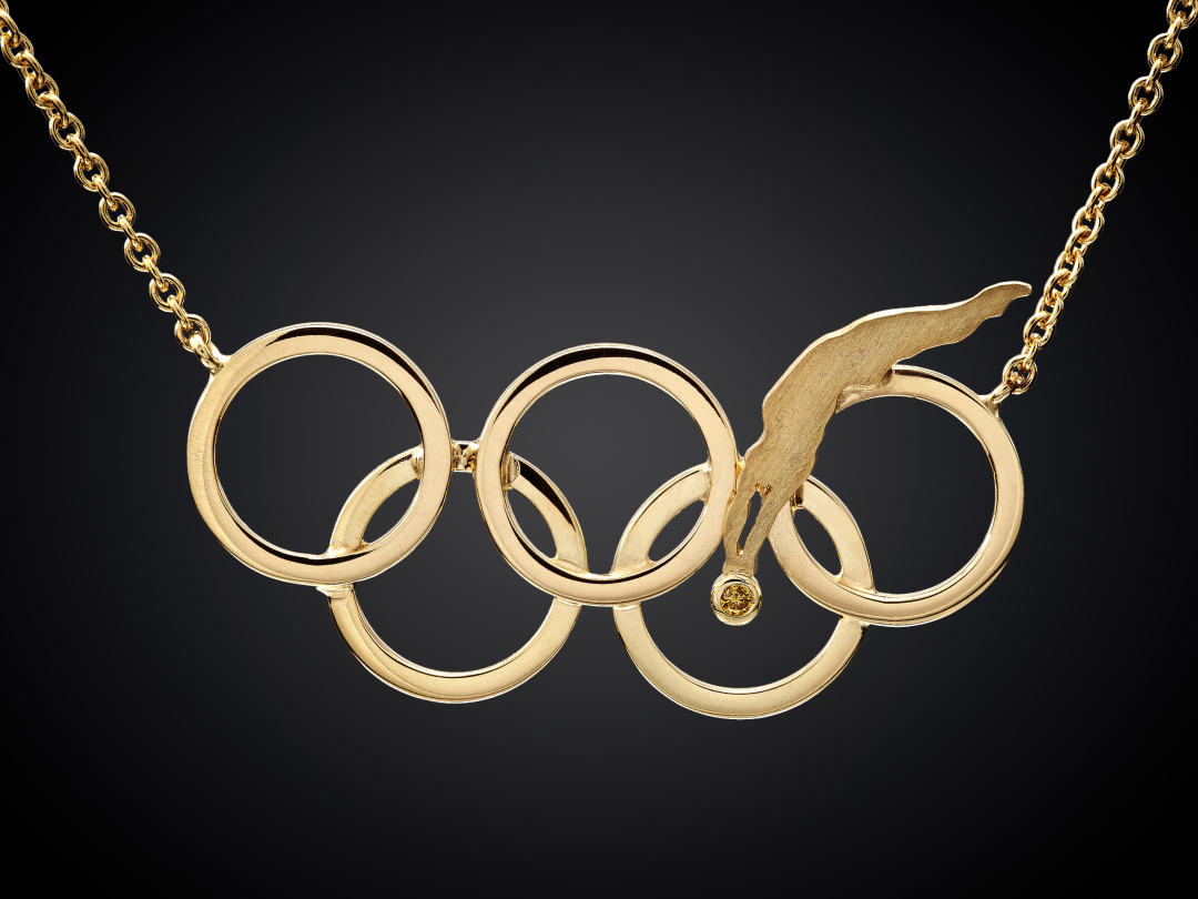 MM Olympisch | 14 karaat geelgouden collier olympische ringen met miniatuur sporter