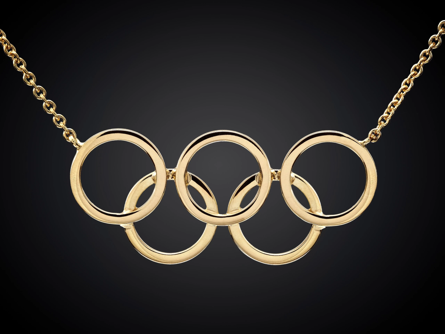 Olympiade | 14 karaat geelgouden collier met olympische ringen | groot| aan een anker collier
